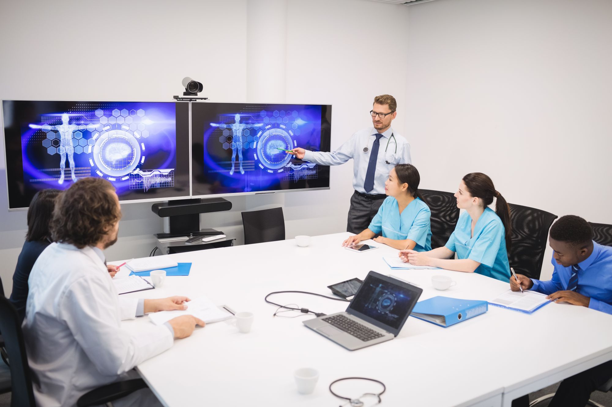 Healthcare interview session analyzing clinical workflow and technology usage patterns