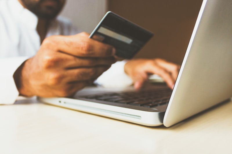 Cybersecurity professional using secure access card in healthcare environment