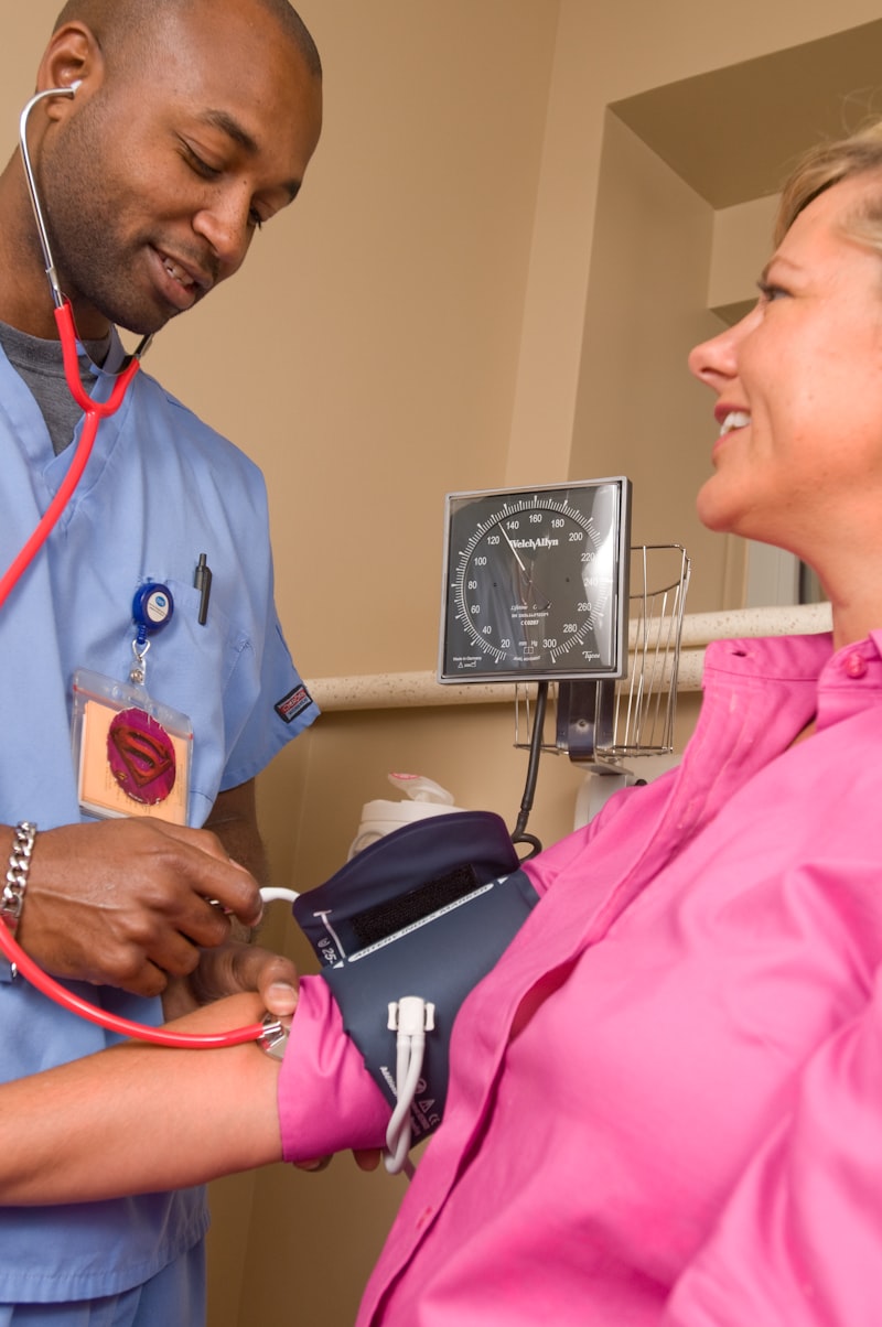 Healthcare worker using mobile clinical device for patient care and workflow efficiency