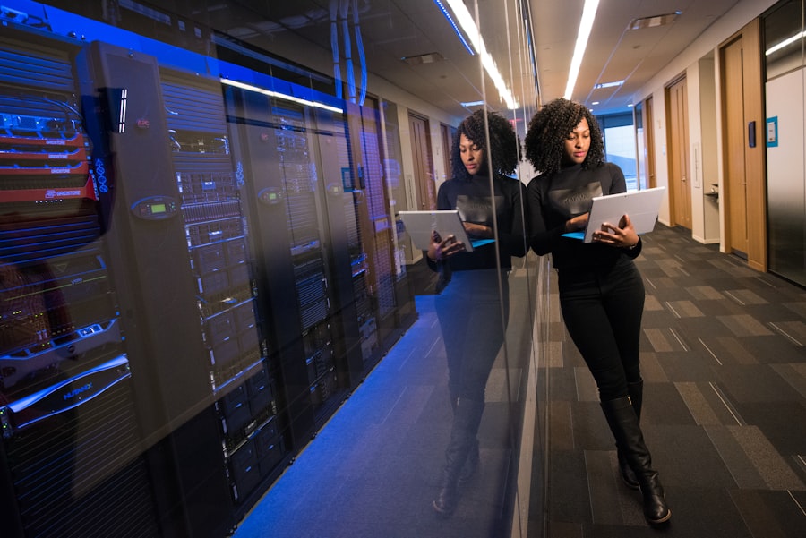 IT professional reviewing secure healthcare systems in a modern data center